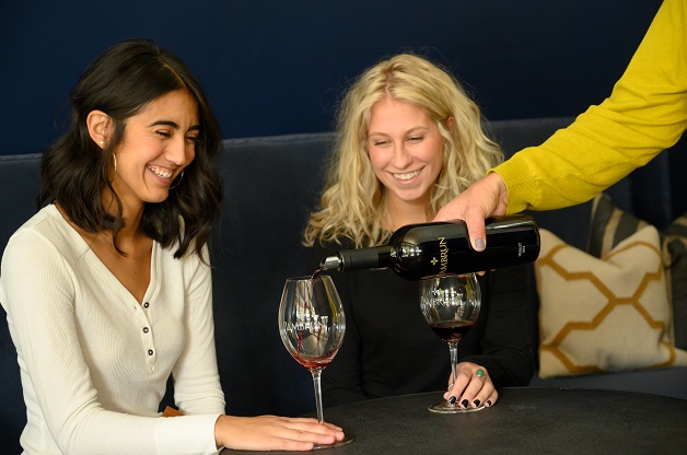 Two guests enjoying Pambrun wine